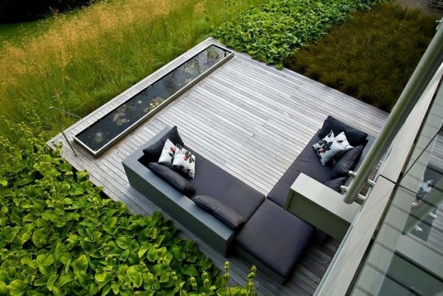 terrasse design træplanker gulve dam lang siddeområde havblade