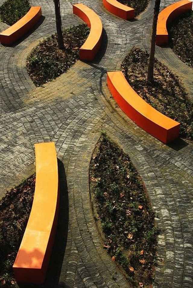 landskabspleje have design billeder blomsterbed bænk sæder orange