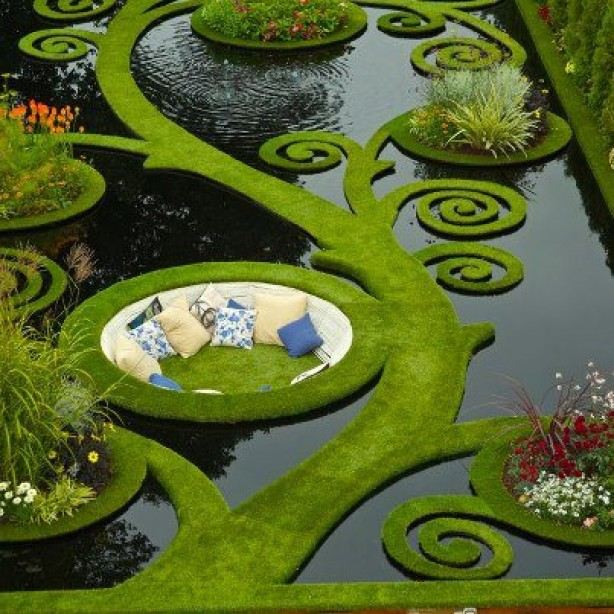 landskabshave design ekstraordinært springvand mos siddeområde i midten