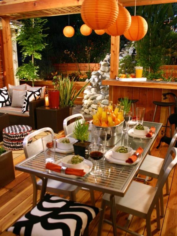 Dekorationsideer til efterårsfest haveborddekorationer orange papirlamper