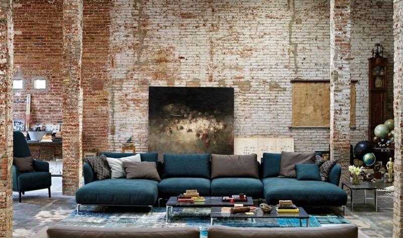 ideer til vægdesign mursten moderne gips sofa blå
