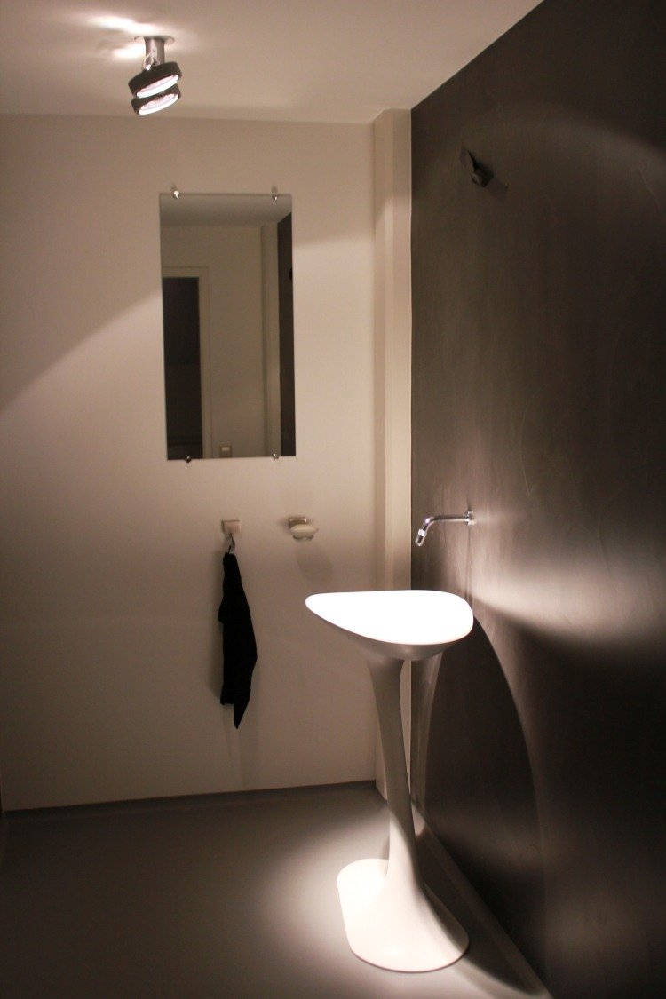 håndvask-badeværelse-design-innovativ-vask-konsol-moderne-futuristisk-væg-farve-sort