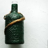 gör-det-själv-versionen av den ursprungliga dekorationen av läderflaskor bild
