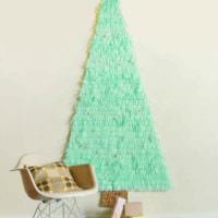 مثال على إنشاء شجرة عيد الميلاد غير عادية من الورق بيديك صورة