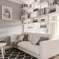 Dekorativa kuddar på vit soffa