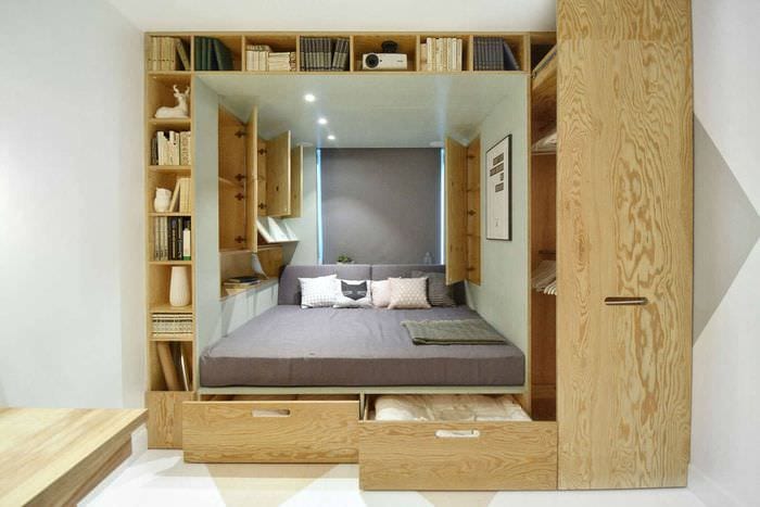 غرفة نوم 11 متر مربع مع سرير متعدد الوظائف