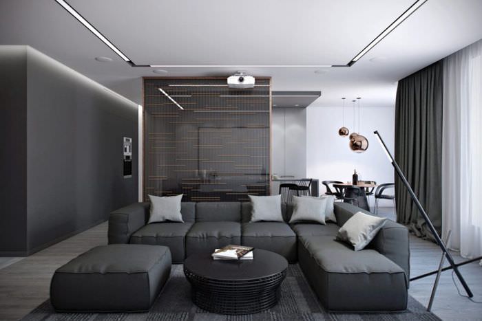 Hjørnegrå sofa i en hall i høyteknologisk stil