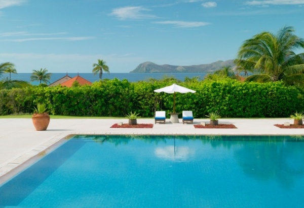 Hotelkompleks ved havet pool Amanpulo Resort