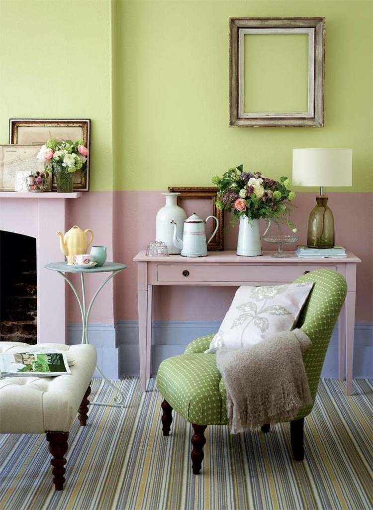 farve til stuen grøn væg design lænestol pejs dekorationer