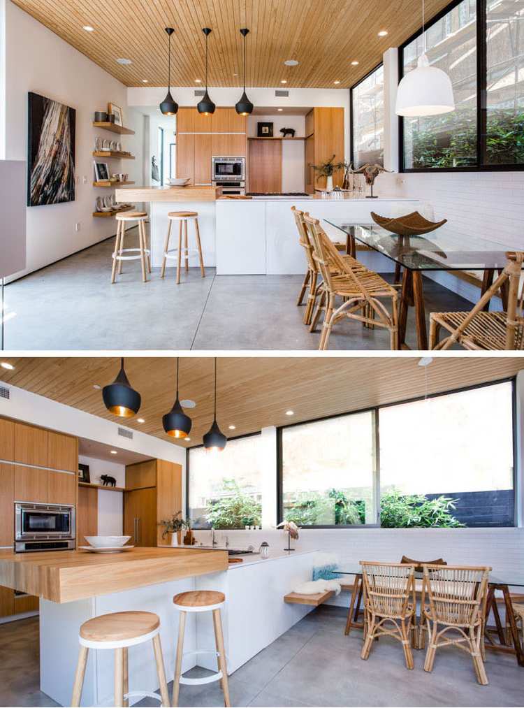 spise-i køkken-moderne-hvidt-træ-køkken modbeton gulv