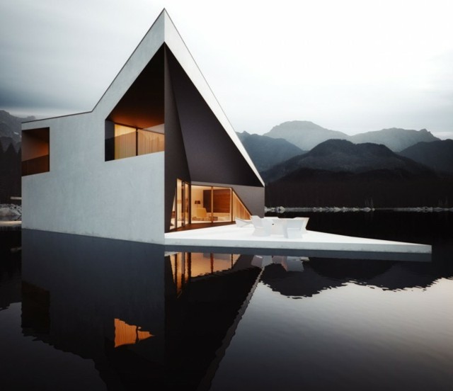 Søhus terrasse stort vindue stenet landskab moderne arkitektur villa