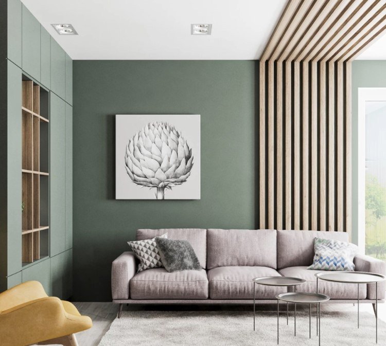 salviegrøn som en vægfarve i stuen passer godt til en grå sofa