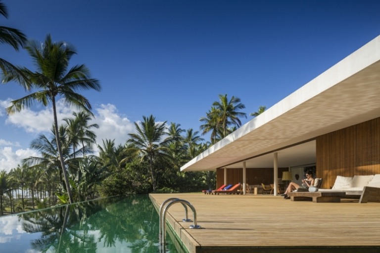 terrasse design pool vindue stue palmer udsigt hav