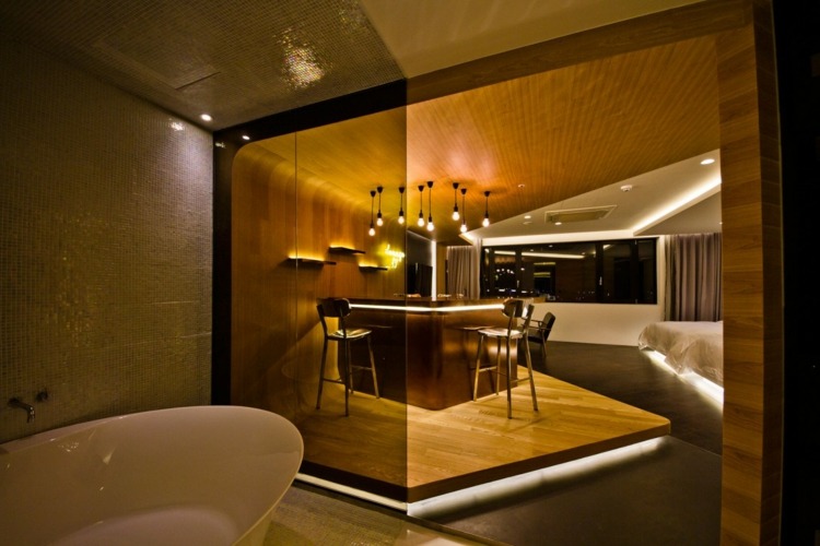 hotelværelse design indirekte belysning badekar mosaik fliser interiør moderne