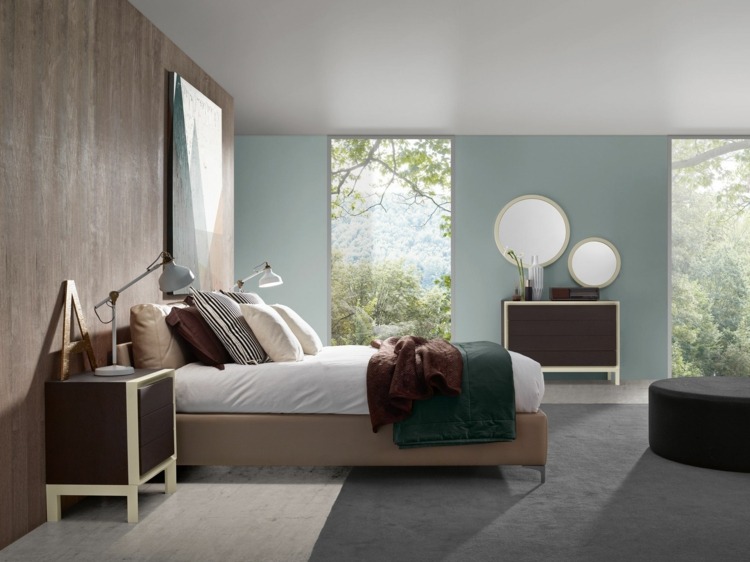 idé-soveværelse-træ-vægbeklædning-pastel-blå-væg-farve-grå-tæppe-beige-læder-seng-rundt-væg-spejl
