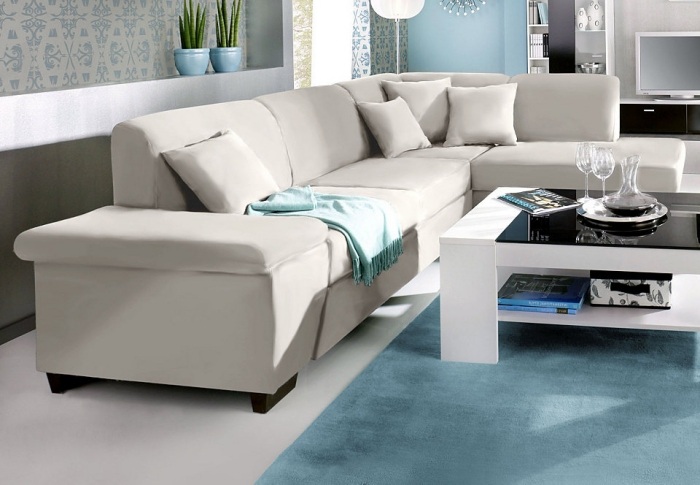 Sofa-med-osmannisk-polstret-hjørneseng-funktion-med-osmannisk-creme