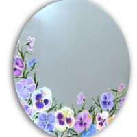 رسومات الزهور على مرآة بيضاوية