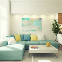 ספה בצבע טורקיז בסלון לבן