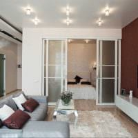 ett alternativ för en vacker design av ett vardagsrum på 17 kvadratmeter bild