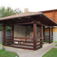 Havepavillon med muret ovn i hjørnet af sommerhuset