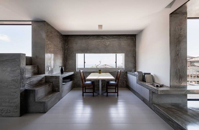 Dvoubarevný interiér jídelního koutu v kuchyni v minimalistickém stylu