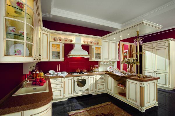 Ett nyinrett kök i en trendig röd färg är inte ett monokromt rum, utan ett två-tre-färgs rum.