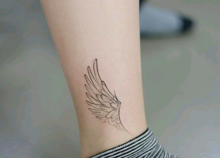 Angel wings tattoo design betyder minimalistiske tatoveringer på foden