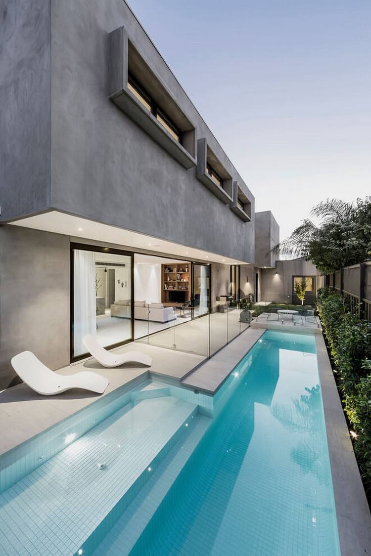 betonhus-pool-minimalistisk-facade-cantilever-belysning