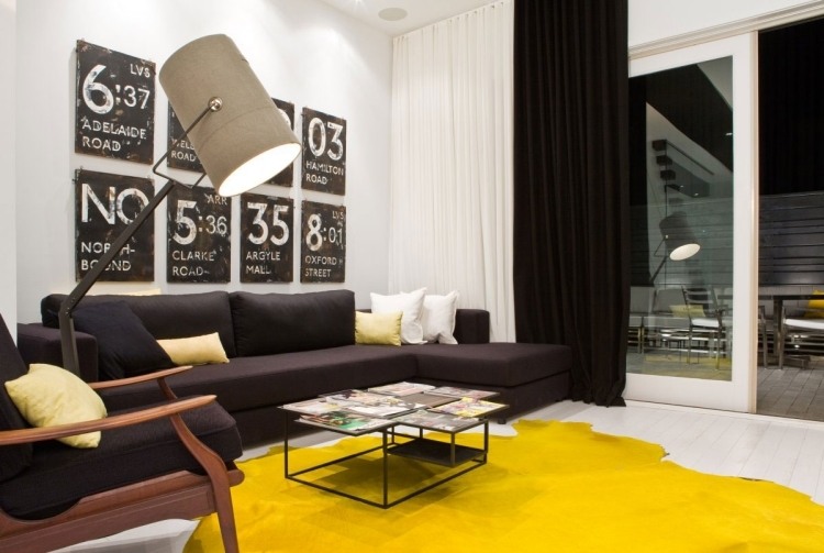 væg-design-sort-hvid-stue-gul-tæppe-spotlights-industri-design-billede væg