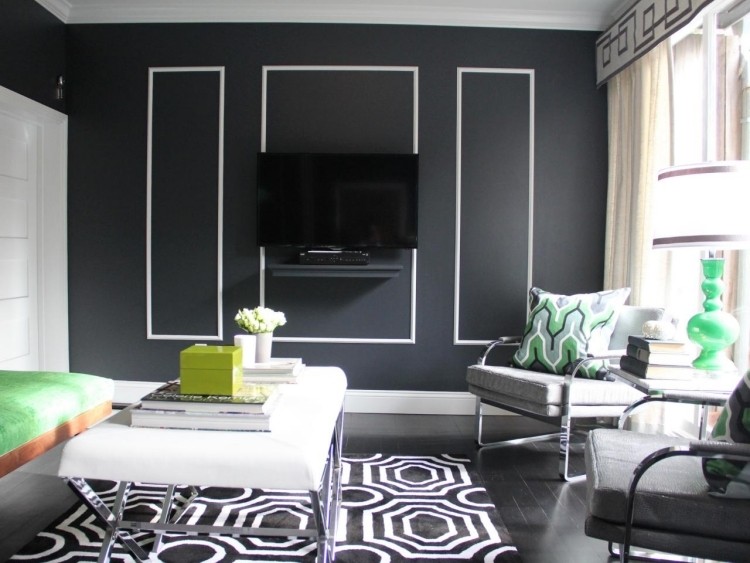 vægdesign-sort-hvidt-tæppe-mønster-lænestol-polstring-grå-tv-bord