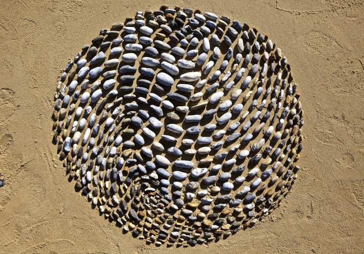 natur mandalas mønster sten sand