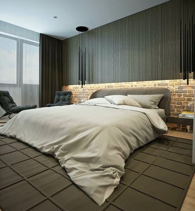 Eldret murstein i det indre av soverommet i stil med minimalisme