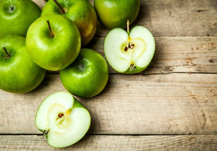 Æbler bruger gasser til at opmuntre orkideer til at blomstre og placeres ved siden af ​​potten