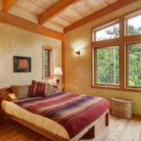 спалня в интериор на дървена къща