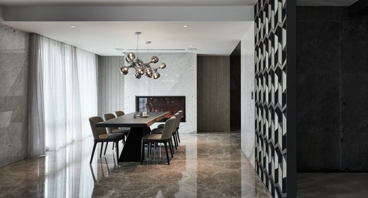 designer rumdeler massivt træ marmorgulv stue pejs minimalistisk indretning