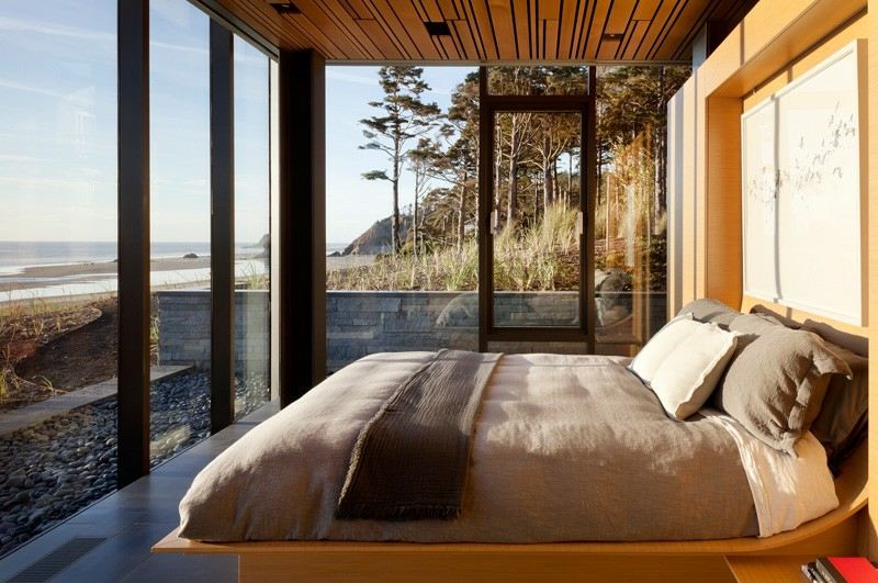 soveværelse med udsigt vindue dør terrasse seng