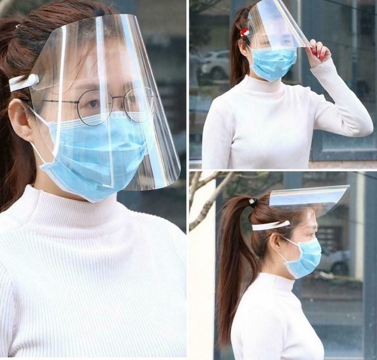 Bær et ansigtsskærm i plast i kombination med en ansigtsmaske