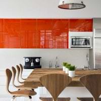 kombinasjon av lys oransje i stil med stuen med andre farger foto