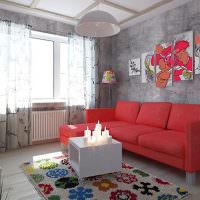 Rød sofa i et rom med grå vegger