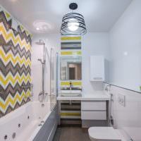 Svetlý mozaikový vzor na stene kúpeľne