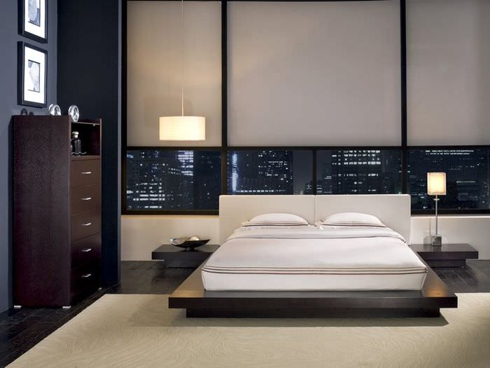 Интериор на спалня на модерен мъж в стила на минимализма