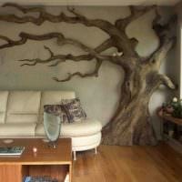ideen om å vakkert dekorere et rom med et tre med egne hender