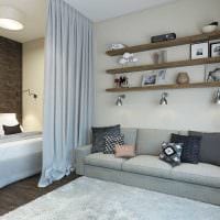 schönes Design von Schlafzimmer und Wohnzimmer in einem Raumfoto