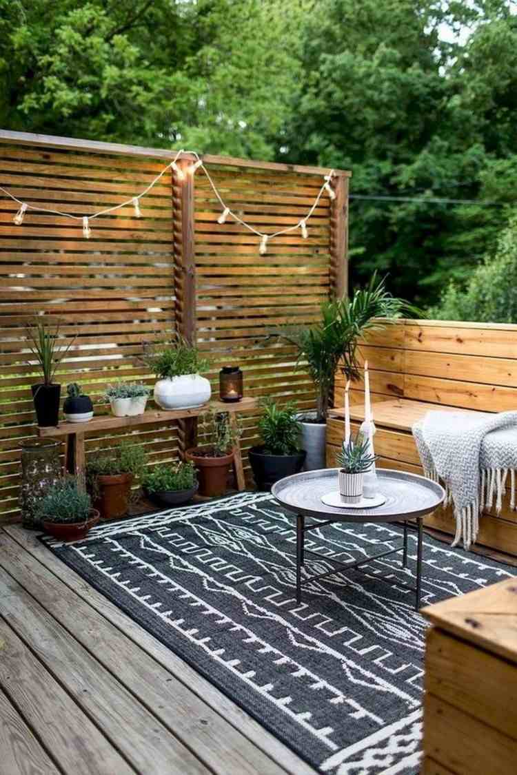 Terrasse design ideer til dekoration med eventyr, stearinlys og planter
