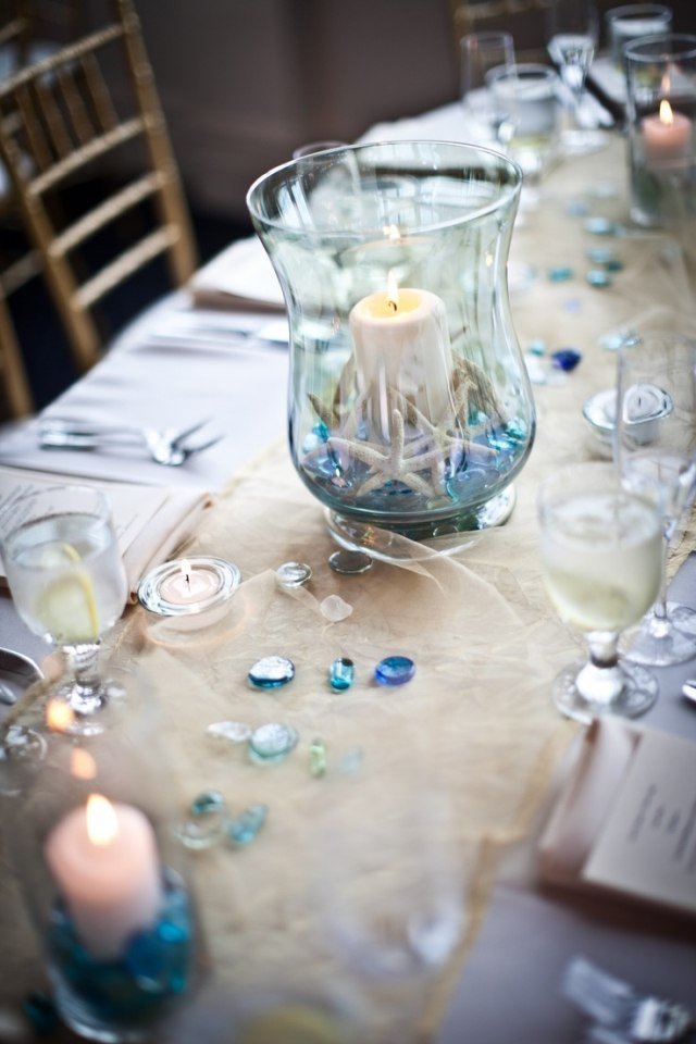 Borddekoration til bryllupsideer-hav-tema-lanterne-søstjerner-dekorative sten