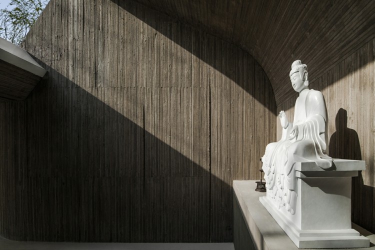 buddha statue tempel bederum betonvægge