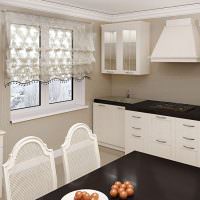 Hvite kjøkkenmøbler med svarte benkeplater