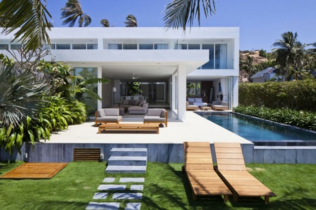 Palm-by-the-ocean villa design hjem
