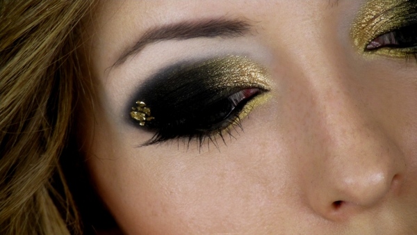 Nytår begivenhed rhinestones sort guld make-up forberedelse