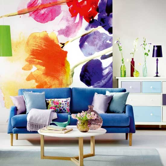 blå polstret sofa stue blomster